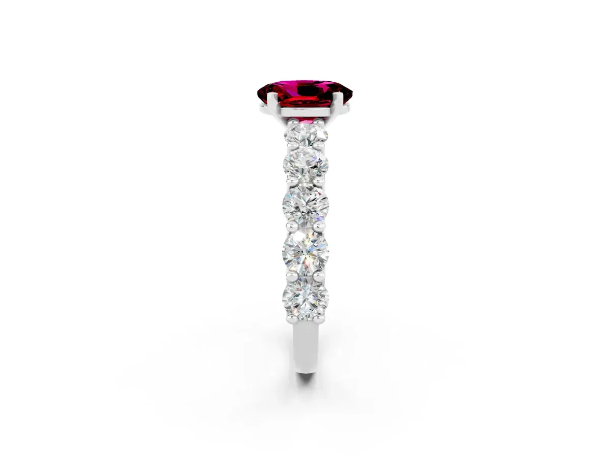 Oval Cut Garnet Prong Setting with Side Stones on a Pave Band Silver