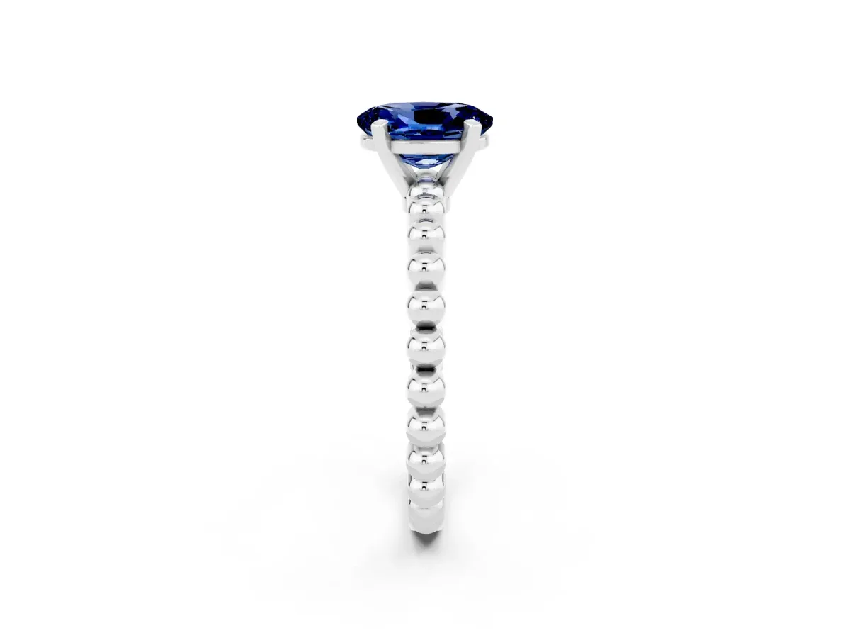 Oval Cut Blue Sapphire Solitaire Ring with Beaded Band and Prong Setting White gold