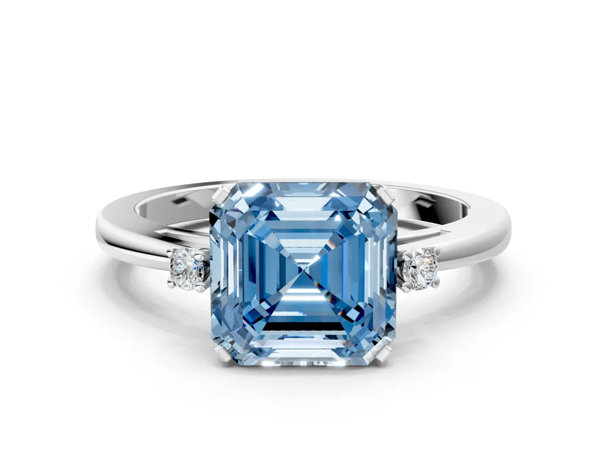 Fancy Blue Asscher Cut Cut Three-Stone Solitaire Ring with Round Accent Diamonds and Four-Prong Setting Platinum