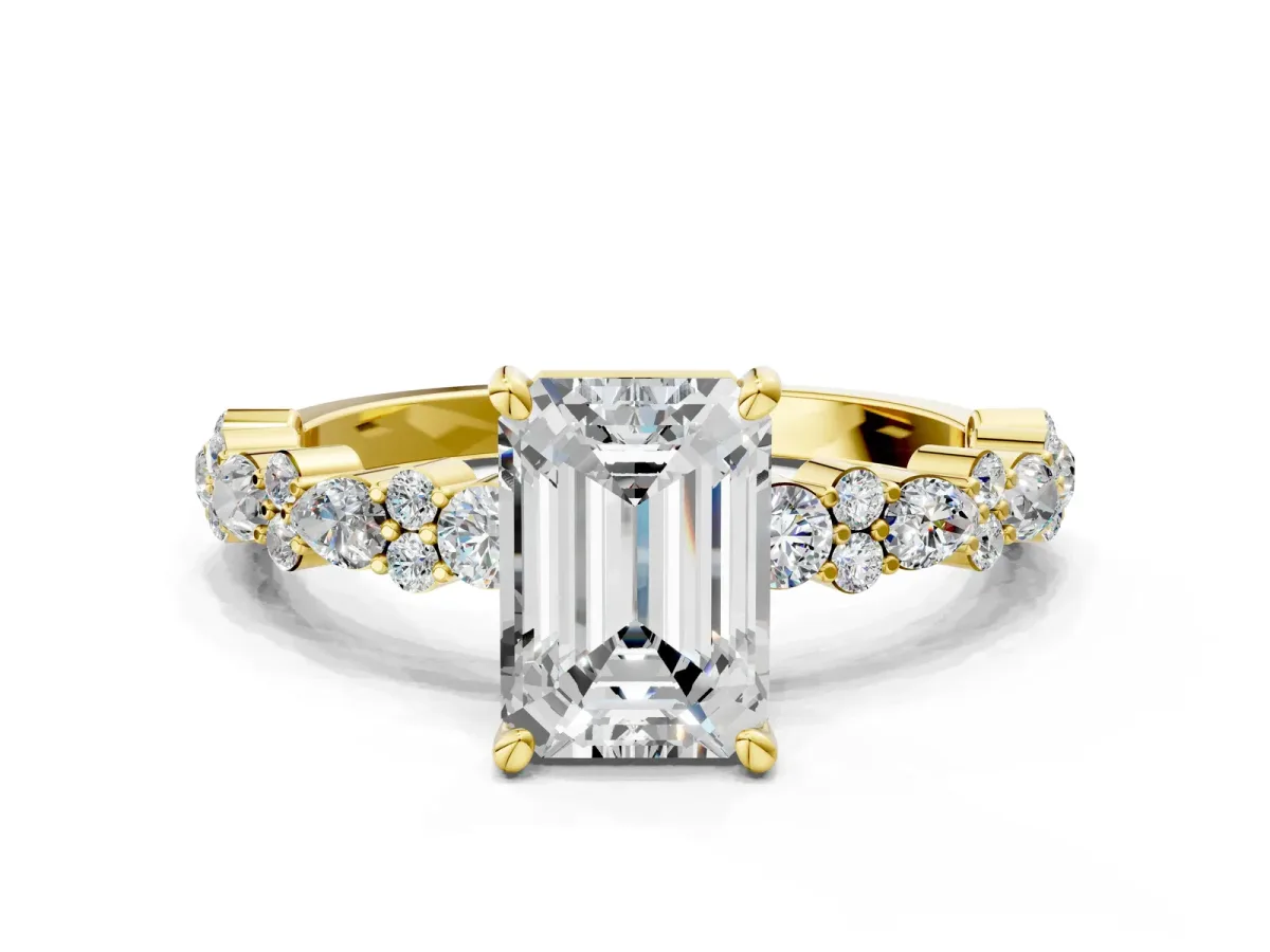 Emerald Cut Diamond Side Stone Solitaire Ring with Round and Four-Prong Setting Yellow gold