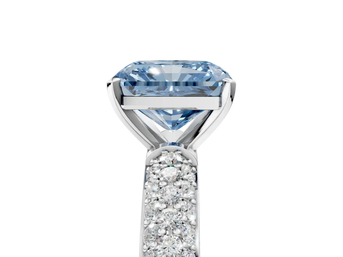 Fancy Blue Radiant Cut Diamond Solitaire Ring with Prong Setting and Pavé Band Platinum