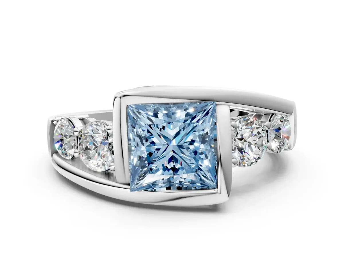 Fancy Blue Bezel Set Princess Cut Diamond Bypass Ring with Round Accents Platinum