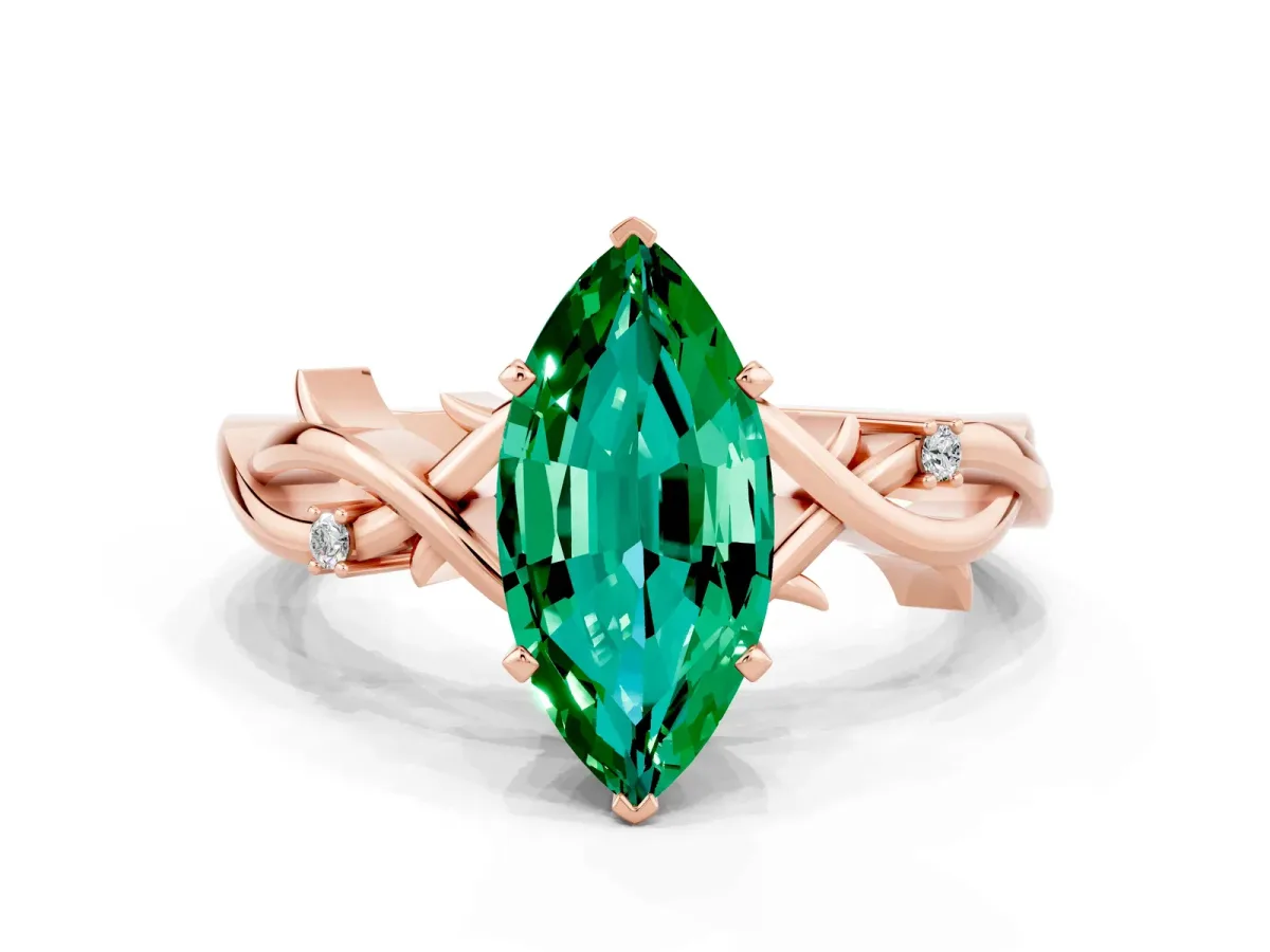 Marquise Cut Emerald Solitaire Ring with Twisted Band and Prong Setting Rose gold