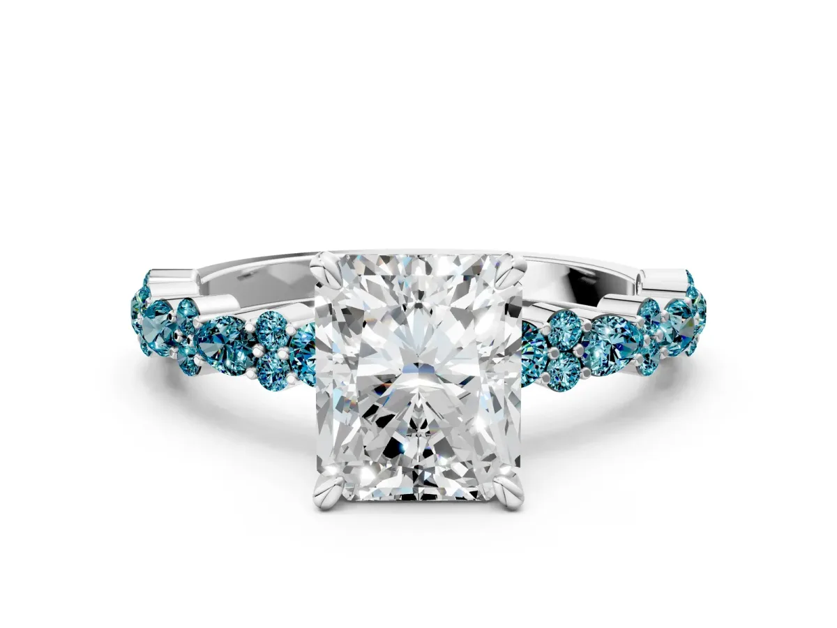 Radiant Cut Diamond Side Stone Solitaire Ring with Round Blue Topaz and Four-Prong Setting Silver