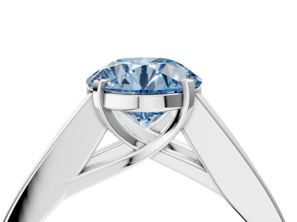 Fancy Blue Round Cut Cut Channel Set Solitaire Ring with Four-Prong Setting Platinum
