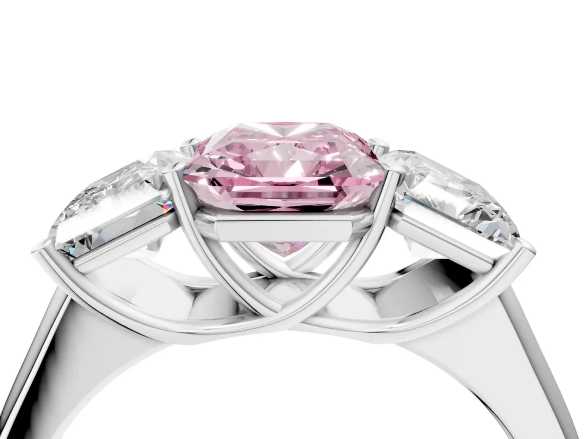 Fancy Pink Radiant Cut Three-Stone Diamond Ring with Prong Setting on a Classic Band Platinum
