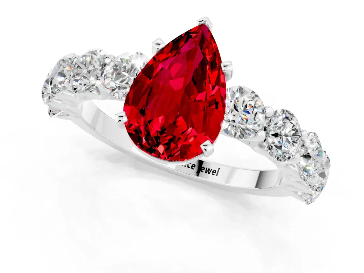 Pear Cut Ruby Prong Setting with Side Stones on a Pave Band Silver