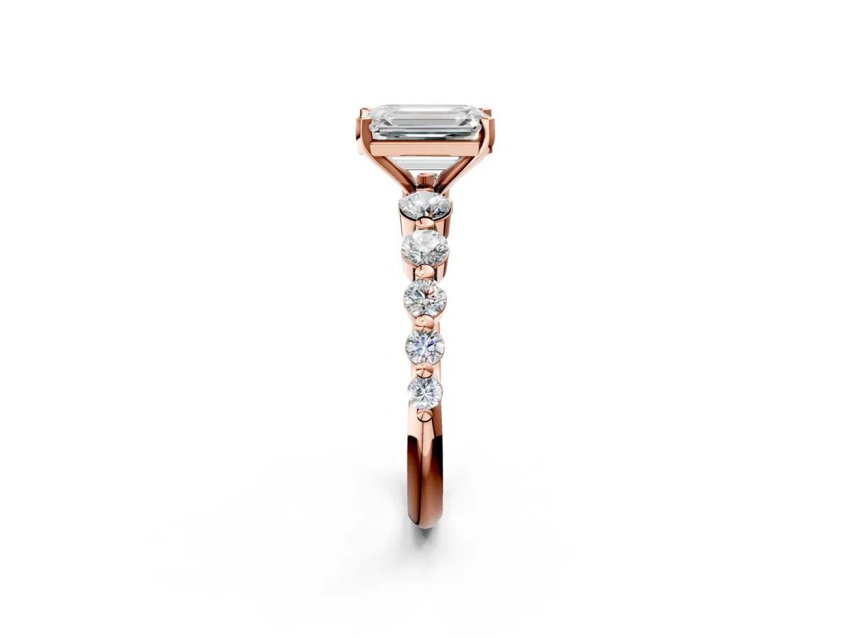 Emerald Cut Solitaire Diamond Ring with Pave Band and Four-Prong Setting Rose gold