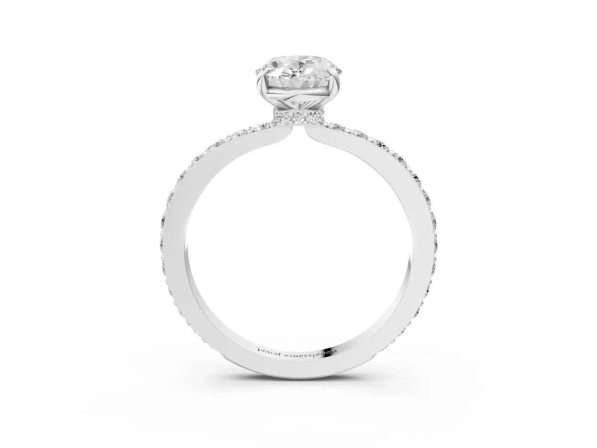 Oval Cut Diamond Solitaire Engagement Ring with Pavé Band and Four-Prong Setting Silver