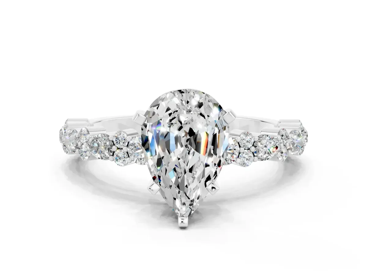 Pear Cut Moissanite Side Stone Solitaire Ring with Round and Four-Prong Setting White gold