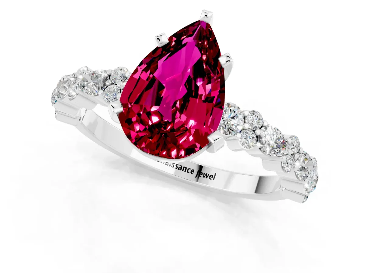 Pear Cut Garnet Side Stone Solitaire Ring with Round and Four-Prong Setting Silver