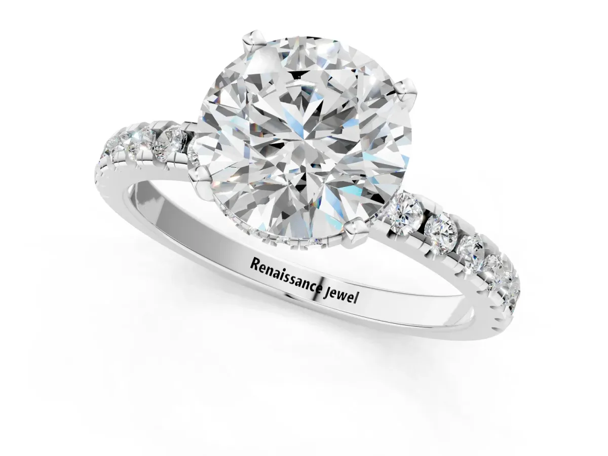 Round Cut Diamond Solitaire Ring with Round Pavé Band and Four-Prong Setting Platinum