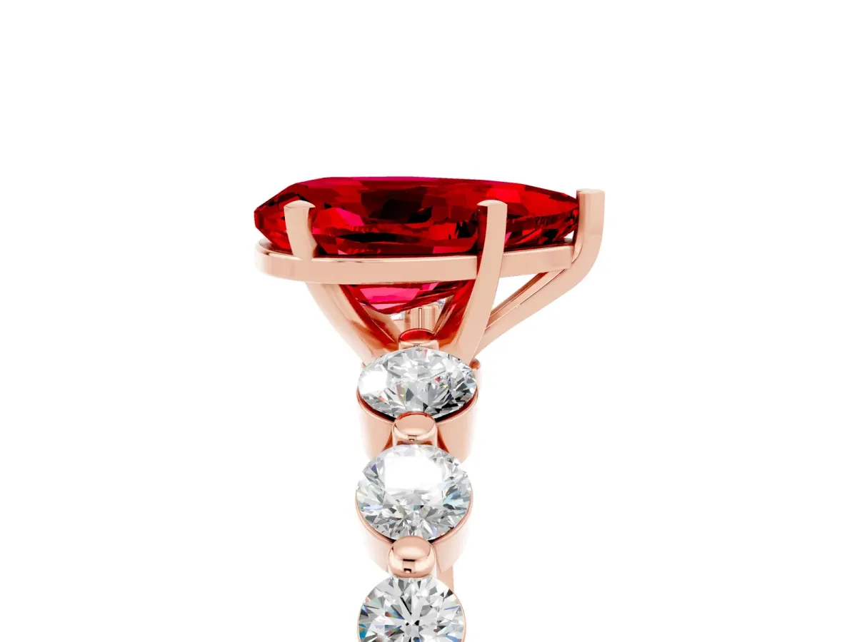 Pear Cut Solitaire Ruby Ring with Pave Band and Four-Prong Setting Rose gold