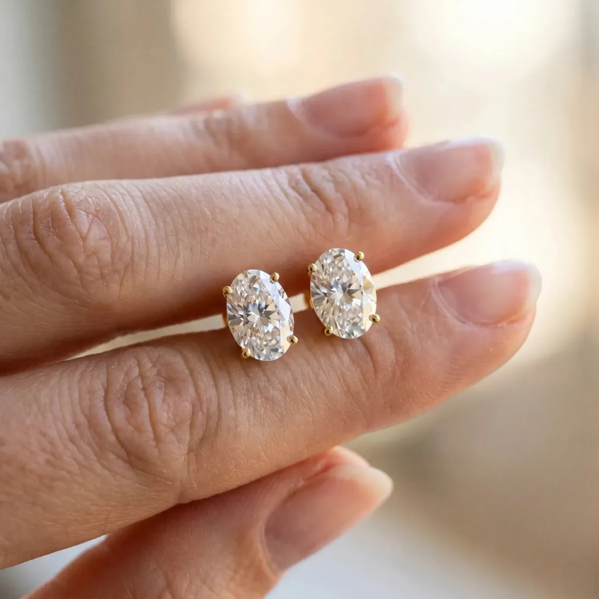 Oval Cut Diamond Stud Earrings Yellow gold