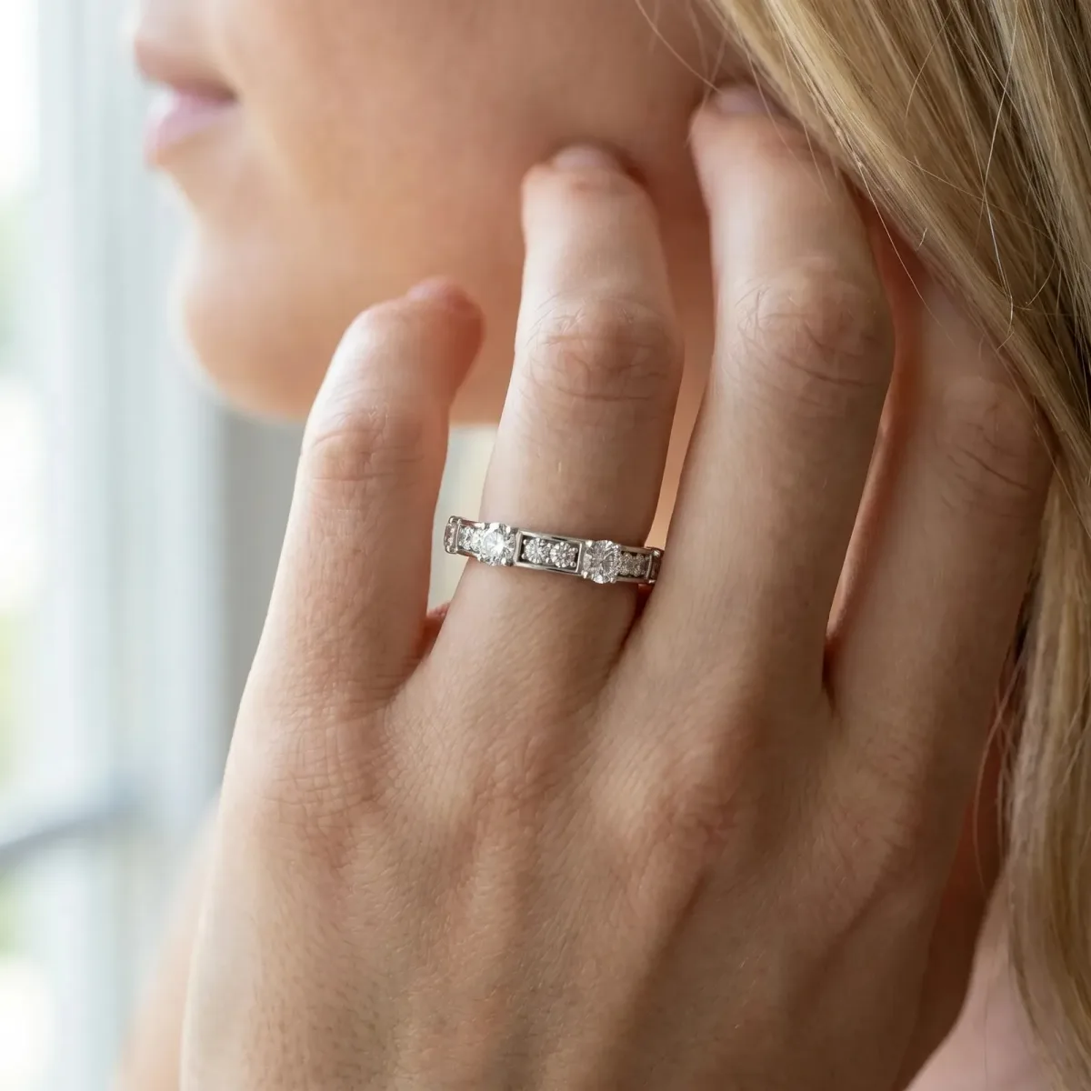 Round Diamond Channel Set Eternity Band with Prong Setting Platinum