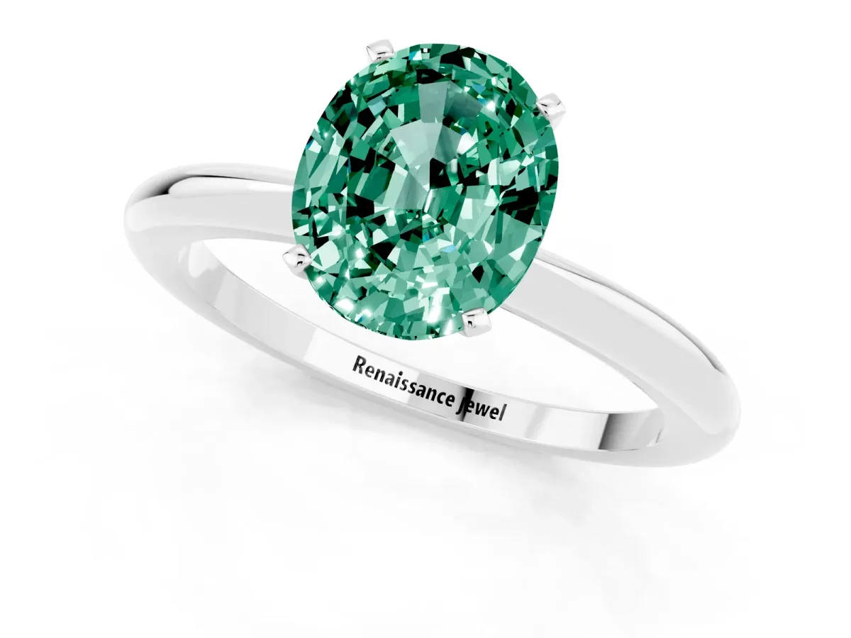 Oval Cut Green Sapphire Solitaire Ring with Six-Prong Setting and Classic Band Silver