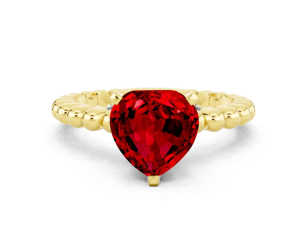 Heart Cut Ruby Solitaire Ring with Beaded Band and Prong Setting Yellow gold