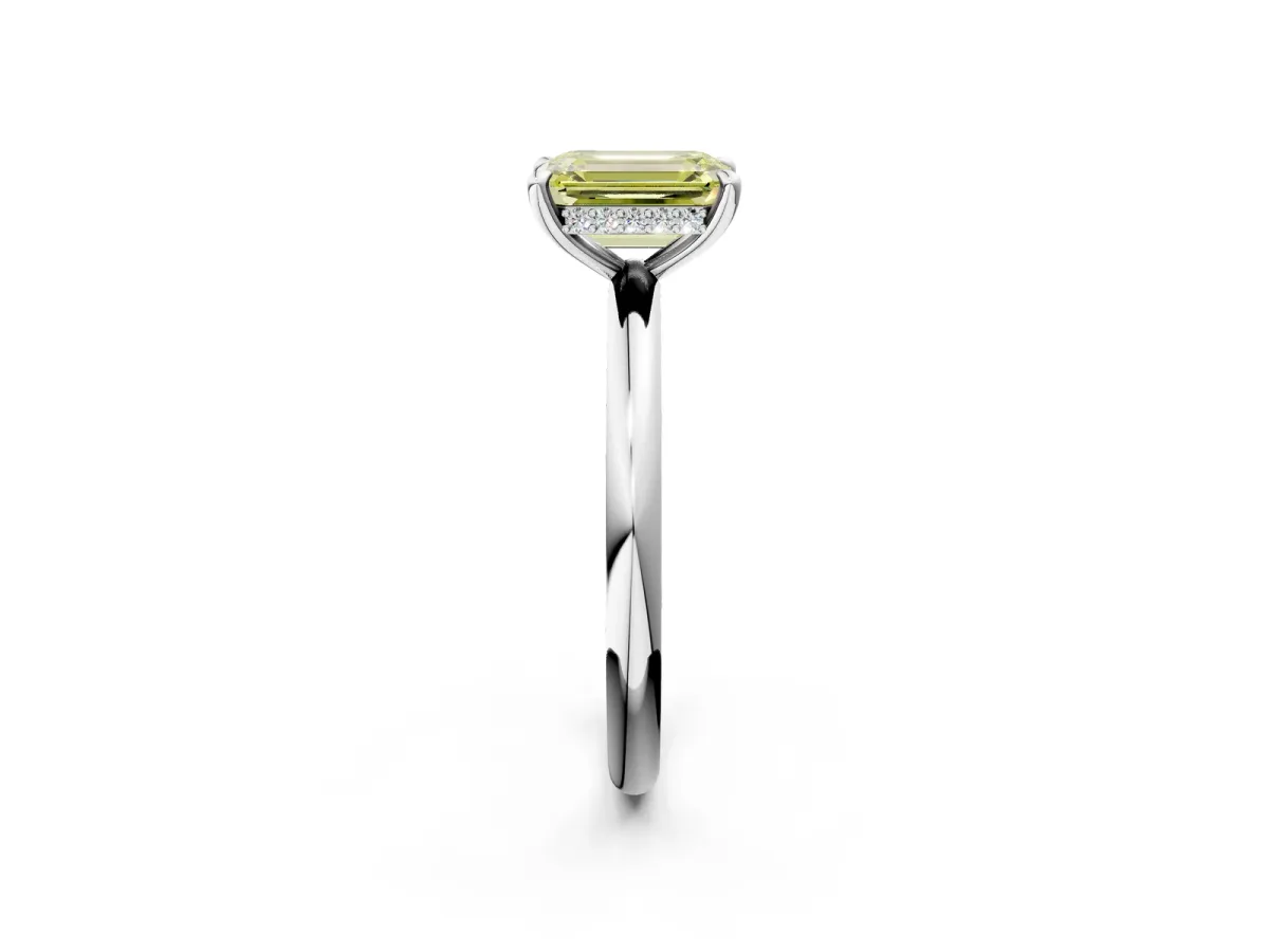 Fancy Yellow Emerald Cut Diamond Solitaire Ring with Thin Band and Four-Prong Setting Platinum