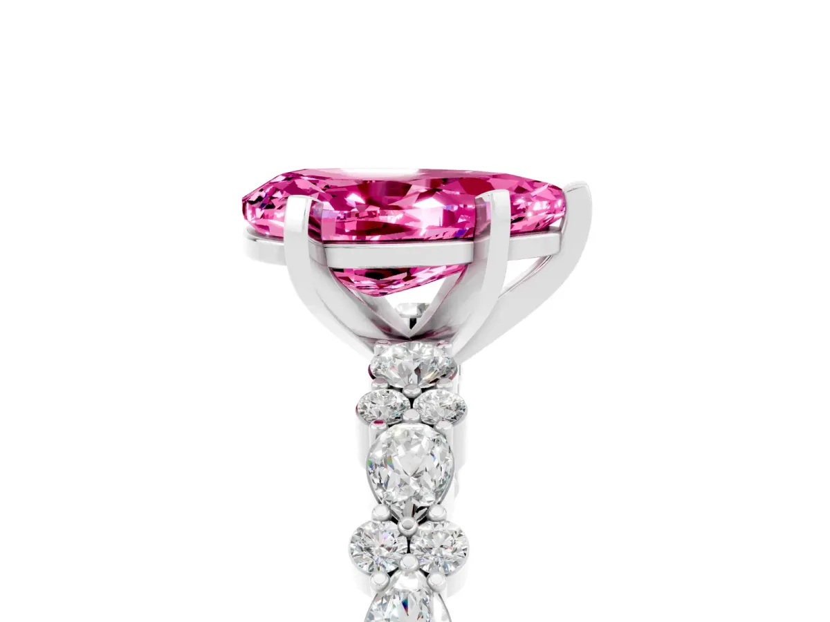 Pear Cut Pink Sapphire Side Stone Solitaire Ring with Round and Four-Prong Setting Silver