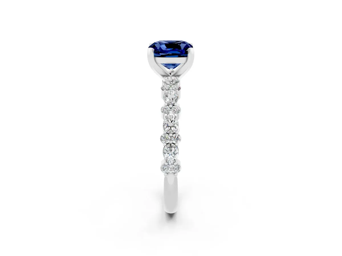 Cushion Cut Blue Sapphire Side Stone Solitaire Ring with Round and Four-Prong Setting Silver