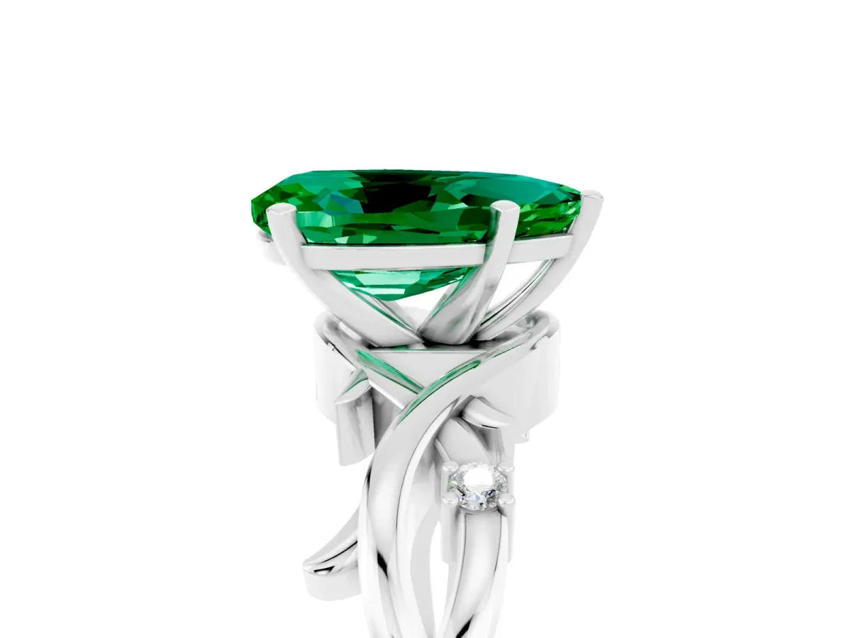 Pear Cut Emerald Solitaire Ring with Twisted Band and Prong Setting Silver