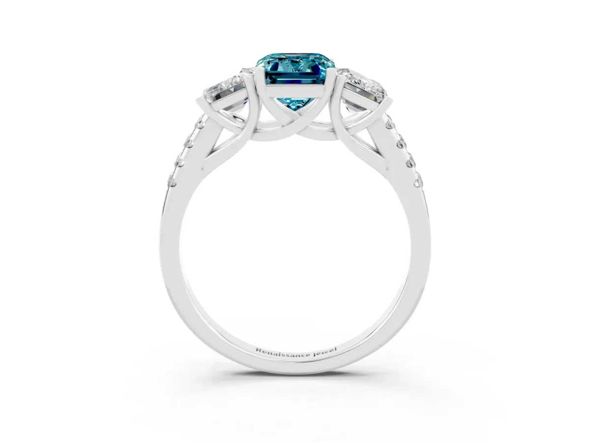 Three-Stone Emerald Cut Blue Topaz Ring with Round Pavé Band and Prong Setting Platinum