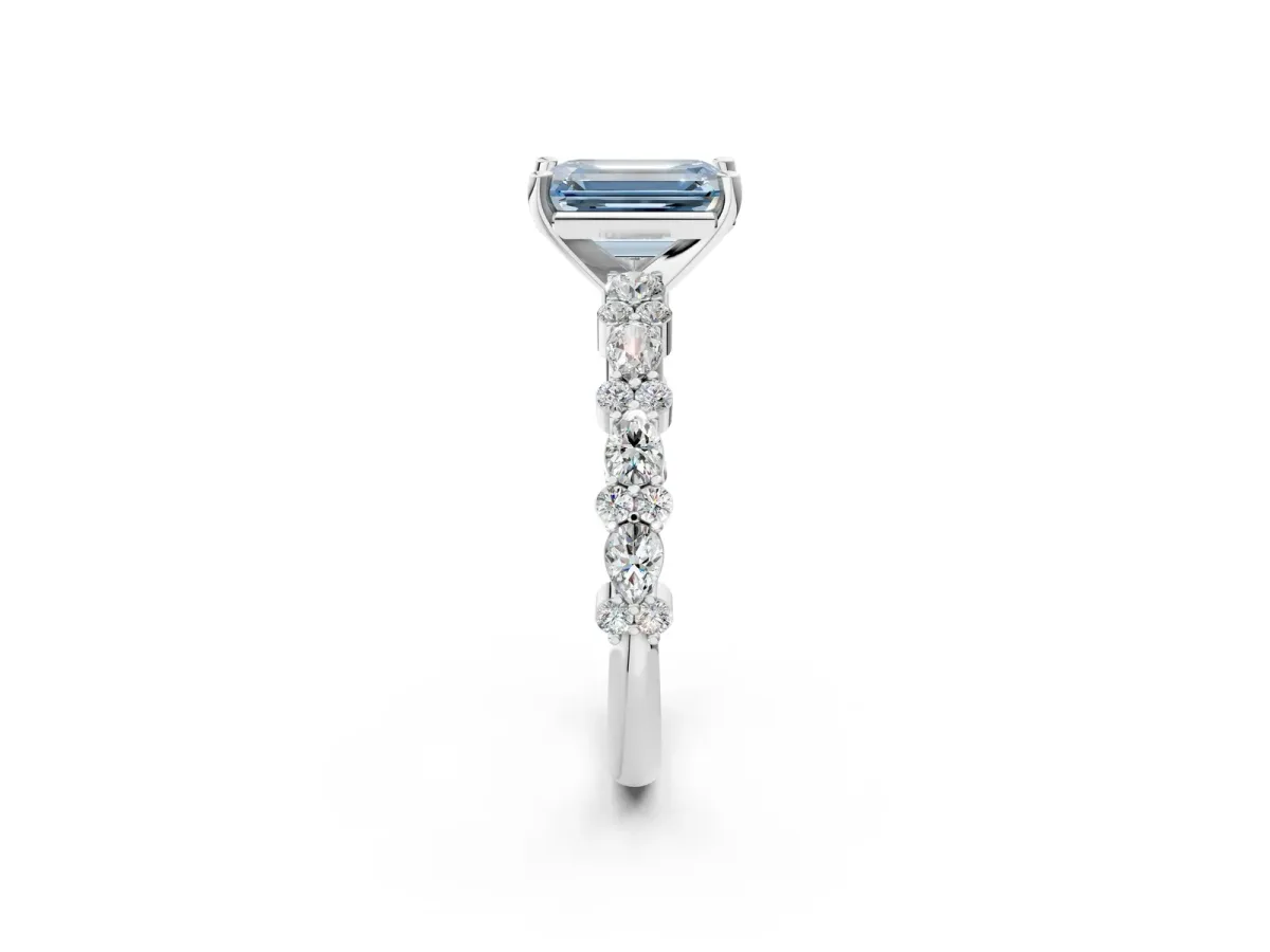Fancy Blue Emerald Cut Diamond Side Stone Solitaire Ring with Round and Four-Prong Setting Platinum