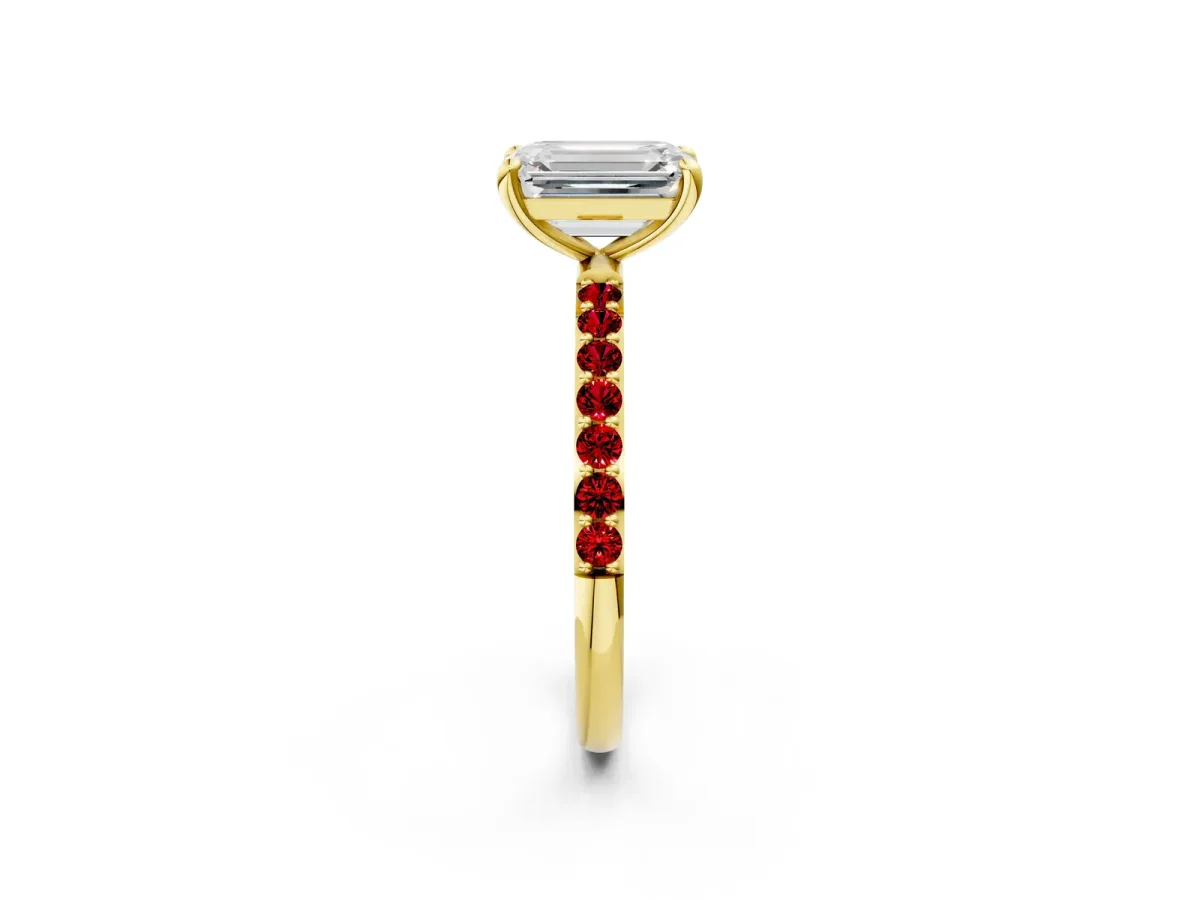 Emerald Cut Diamond Solitaire Ring with Round Ruby Pavé Band and Prong Setting Yellow gold