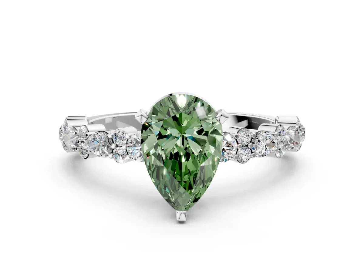 Fancy Green Pear Cut Diamond Side Stone Solitaire Ring with Round and Four-Prong Setting Platinum