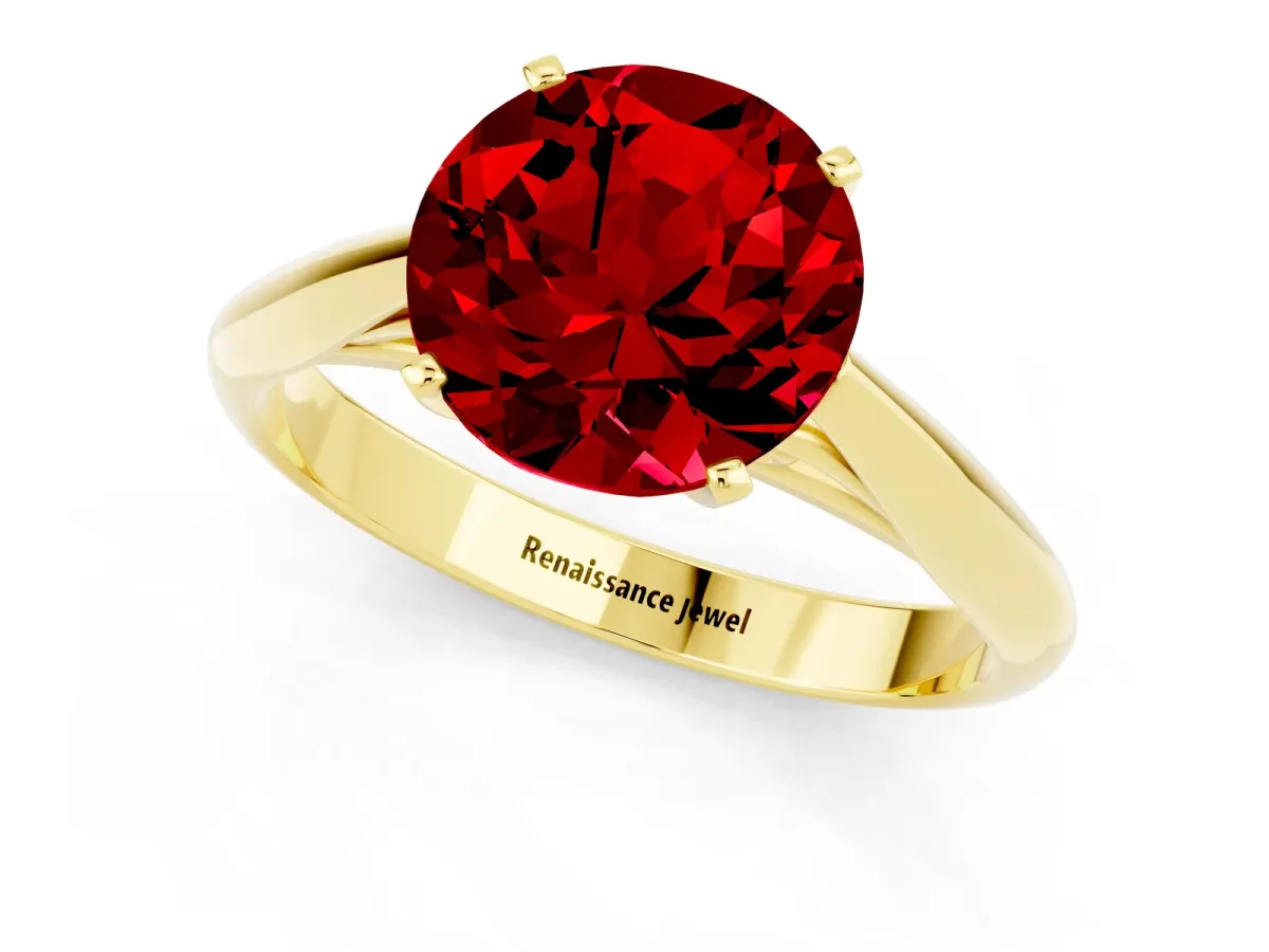 Round Cut Ruby Solitaire Engagement Ring with Cathedral Setting and Four-Prong Mount Yellow gold