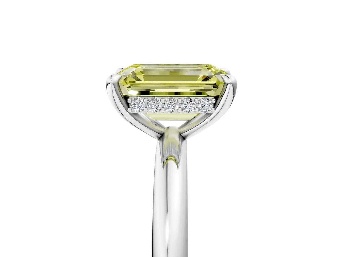 Fancy Yellow Emerald Cut Diamond Solitaire Ring with Thin Band and Four-Prong Setting Platinum