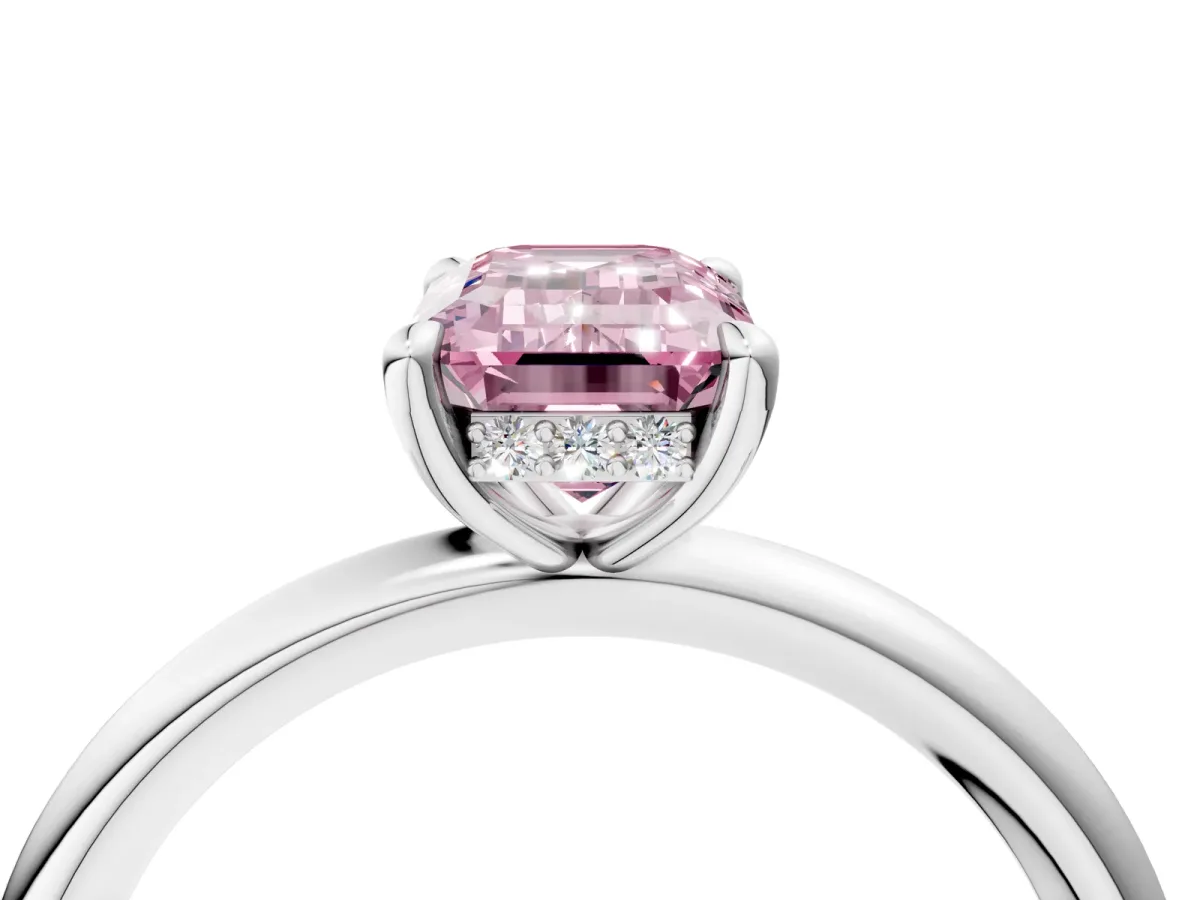 Fancy Pink Emerald Cut Diamond Solitaire Ring with Thin Band and Four-Prong Setting Platinum
