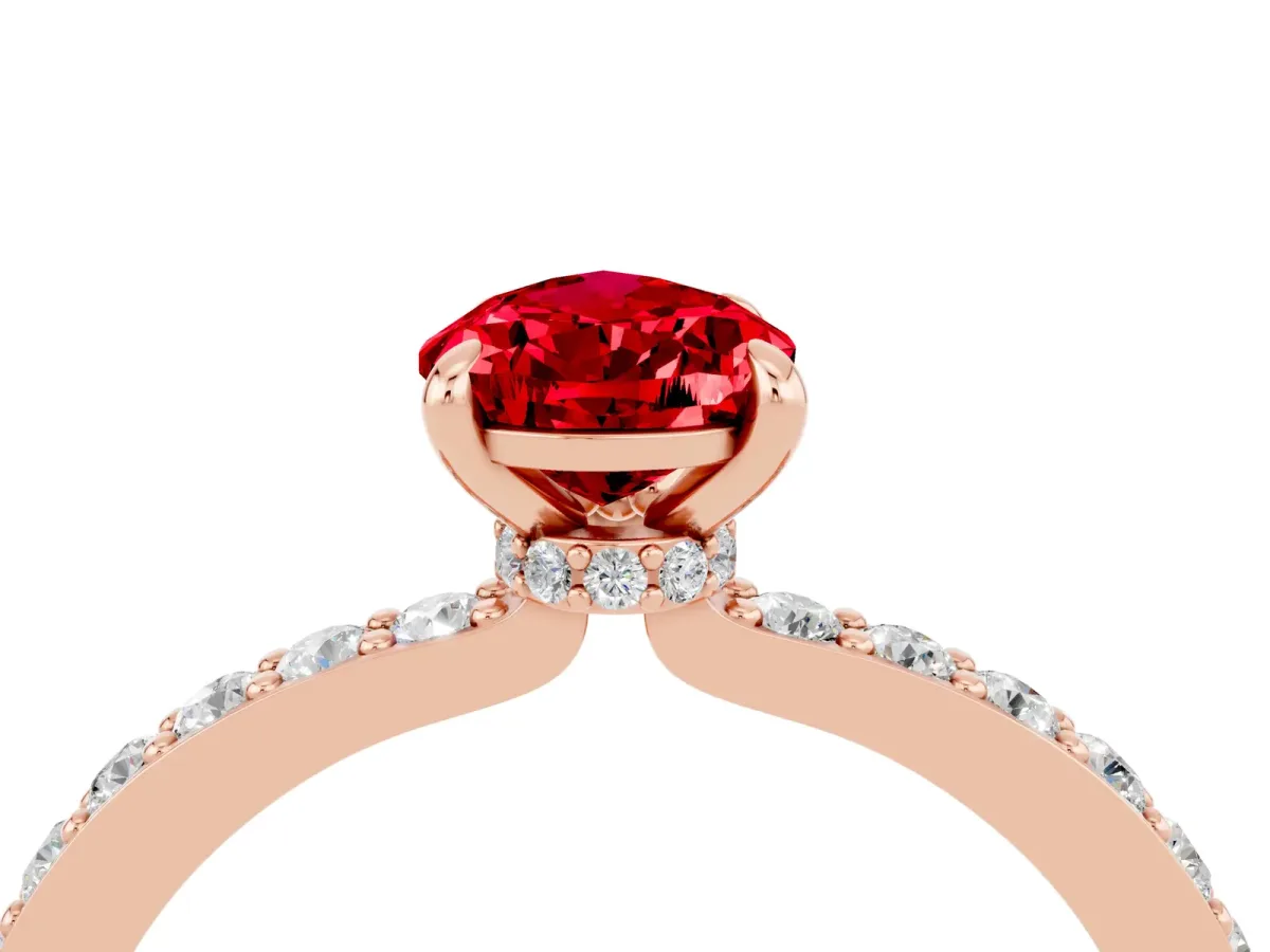 Pear Cut Ruby Solitaire Engagement Ring with Pavé Band and Four-Prong Setting Rose gold