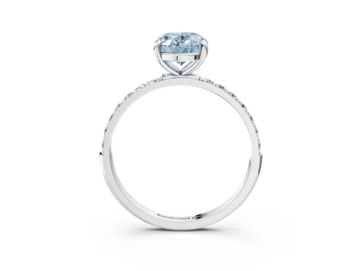 Fancy Blue Oval Cut Diamond Solitaire Ring with Round Pavé Band and Prong Setting Silver