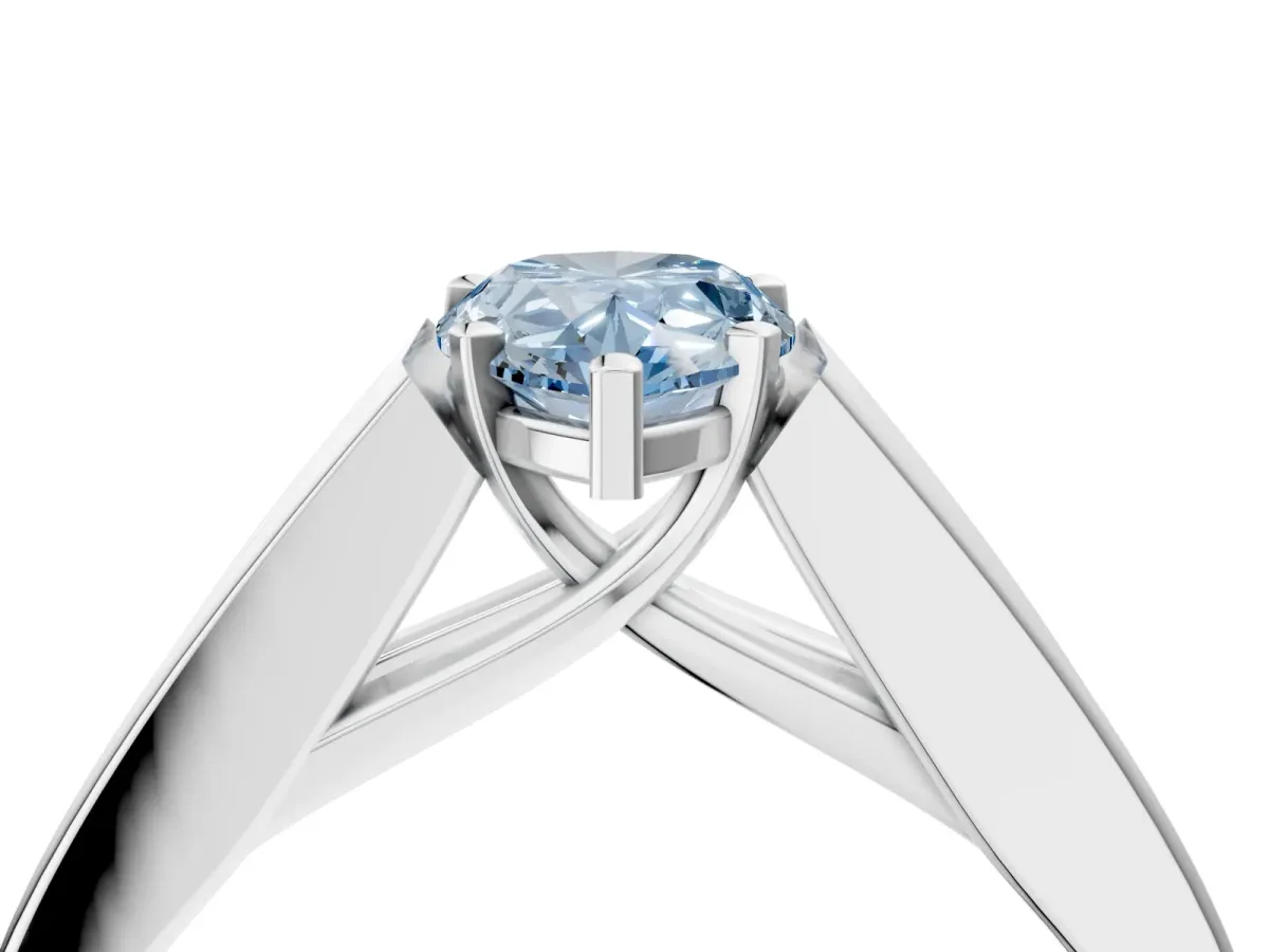 Fancy Blue Pear Cut Cut Channel Set Solitaire Ring with Four-Prong Setting Silver