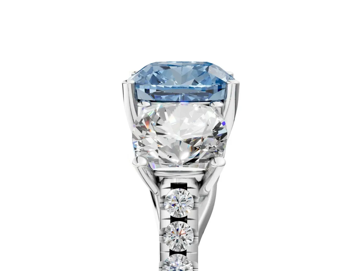 Fancy Blue Three-Stone Cushion Cut Diamond Ring with Round Pavé Band and Prong Setting Silver