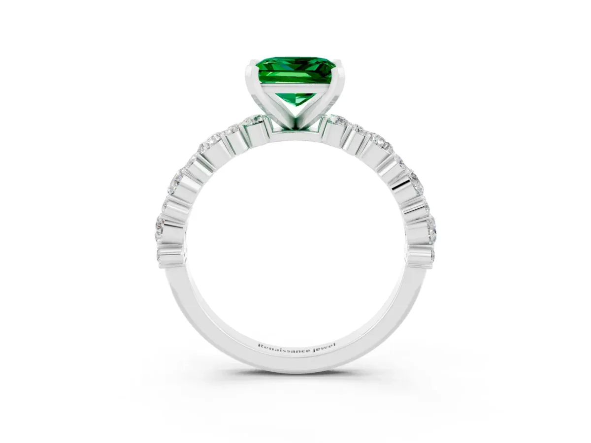 Princess Cut Emerald Side Stone Solitaire Ring with Round and Four-Prong Setting Silver