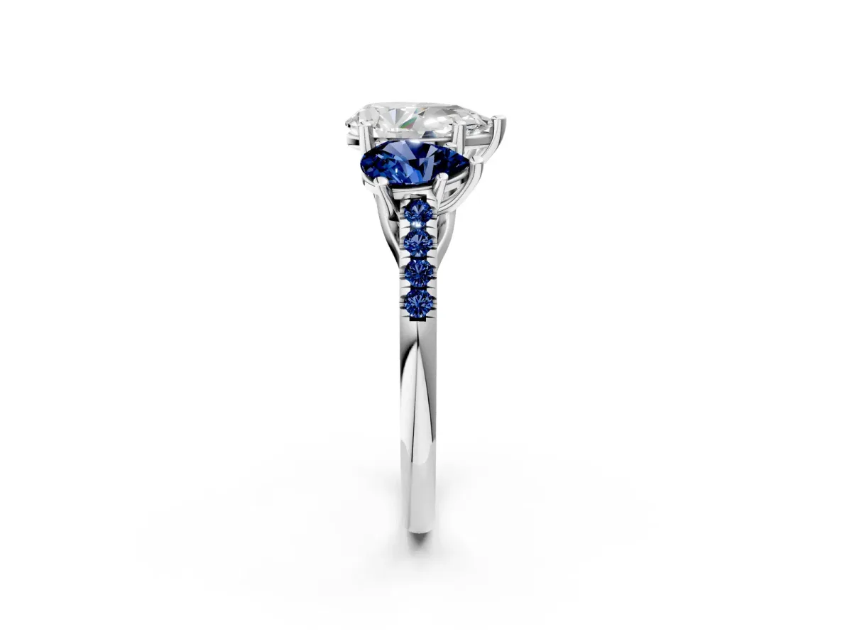 Three-Stone Pear Cut Diamond Ring with Round Blue Sapphire Pavé Band and Prong Setting Silver