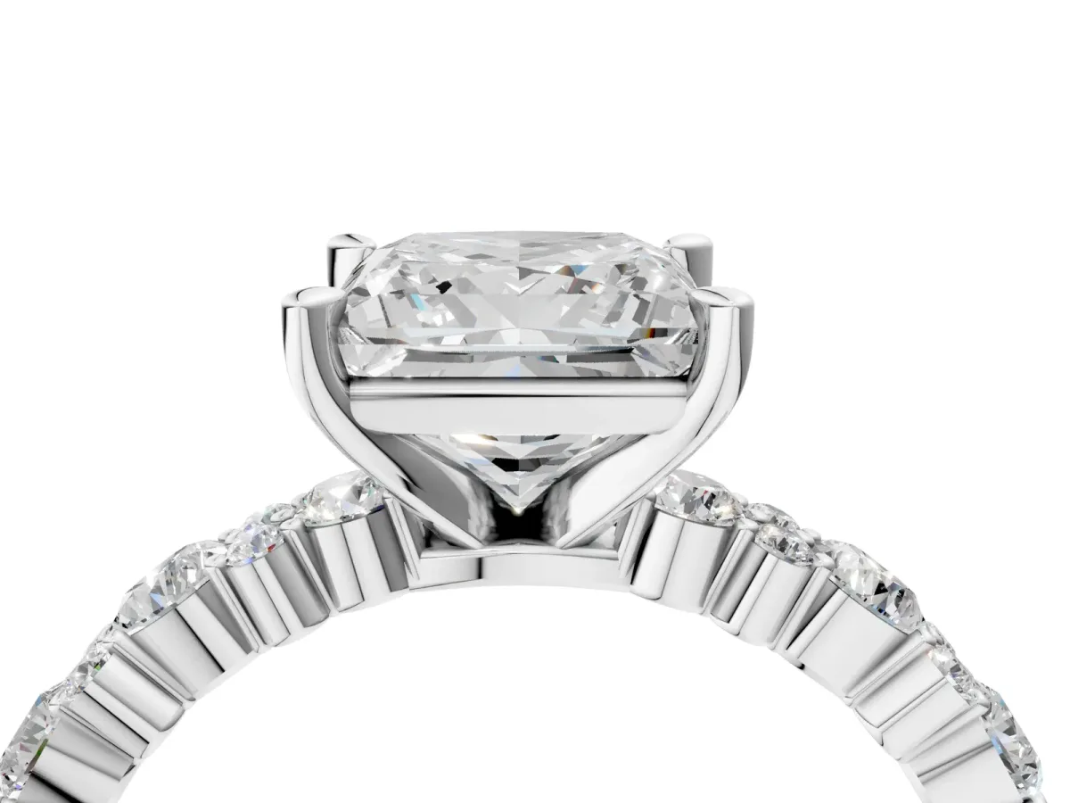 Princess Cut Diamond Side Stone Solitaire Ring with Round and Four-Prong Setting White gold