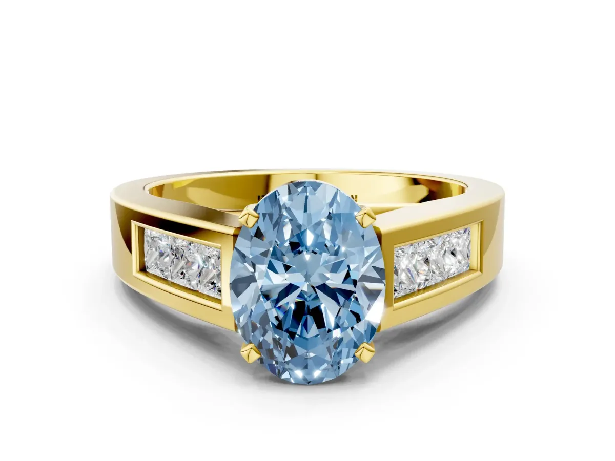 Fancy Blue Oval Cut Cut Channel Set Solitaire Ring with Four-Prong Setting Yellow gold