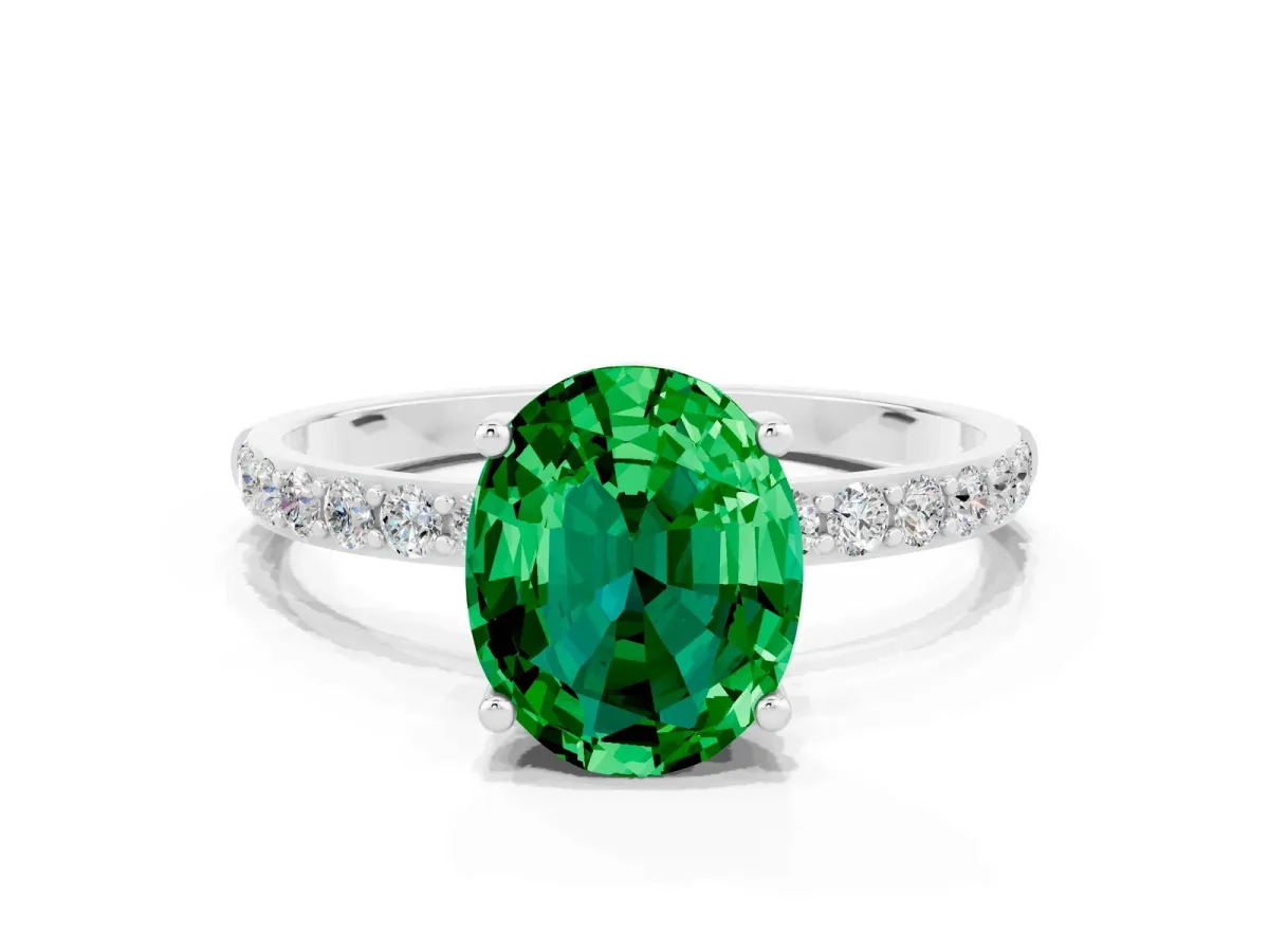 Oval Cut Emerald Solitaire Ring with Round Pavé Band and Prong Setting Silver