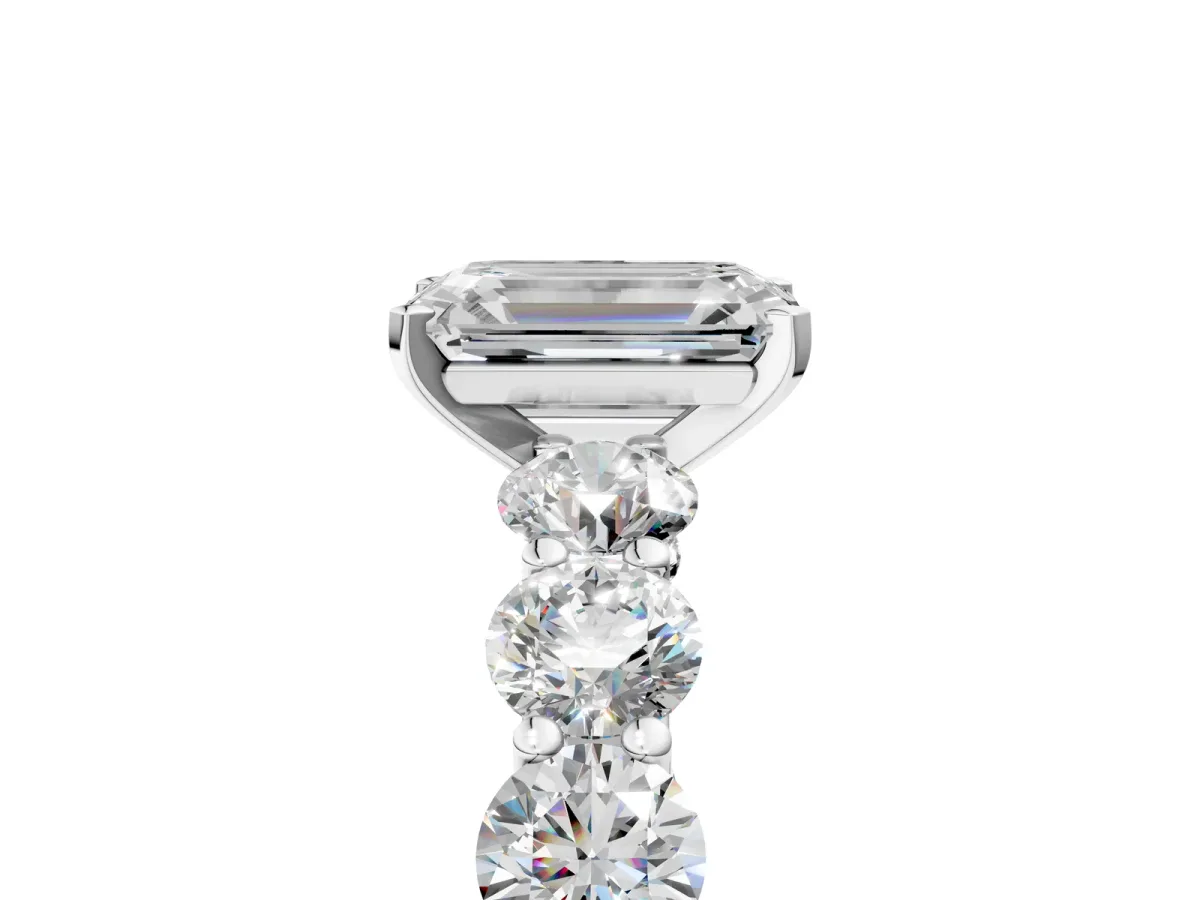Emerald Cut Diamond Prong Setting with Side Stones on a Pave Band Silver