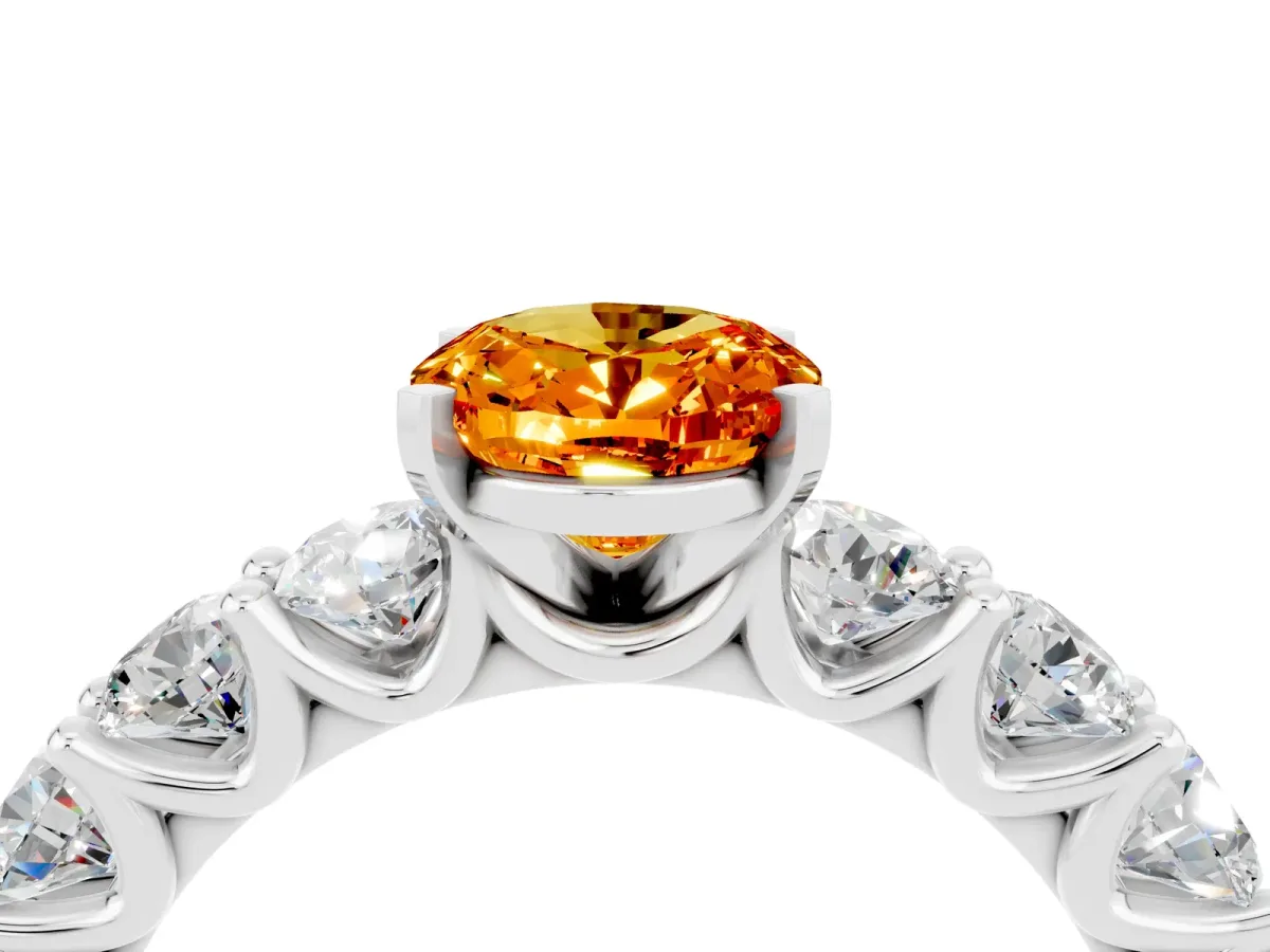 Oval Cut Citrine Prong Setting with Side Stones on a Pave Band Silver