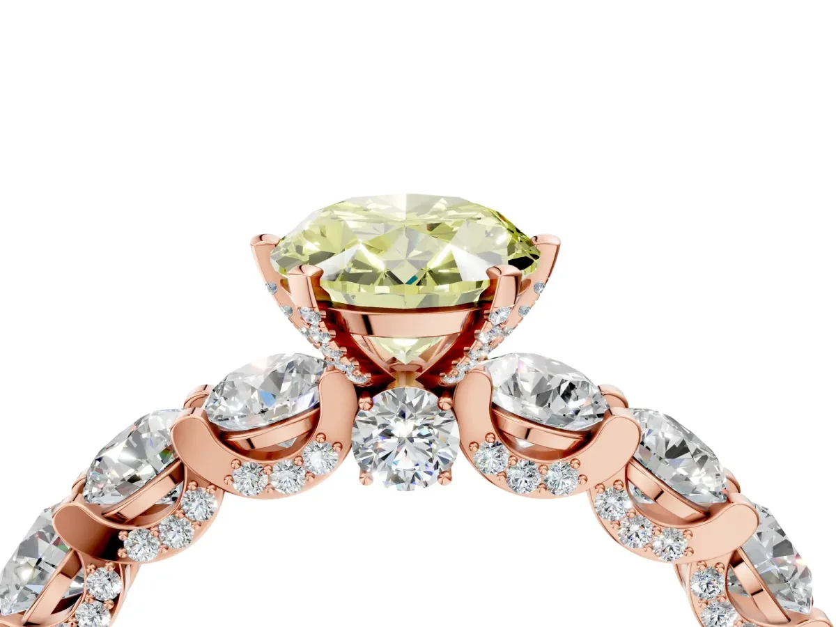 Fancy Yellow Oval Cut Diamond Side Stone Engagement Ring with Four-Prong Setting Rose gold