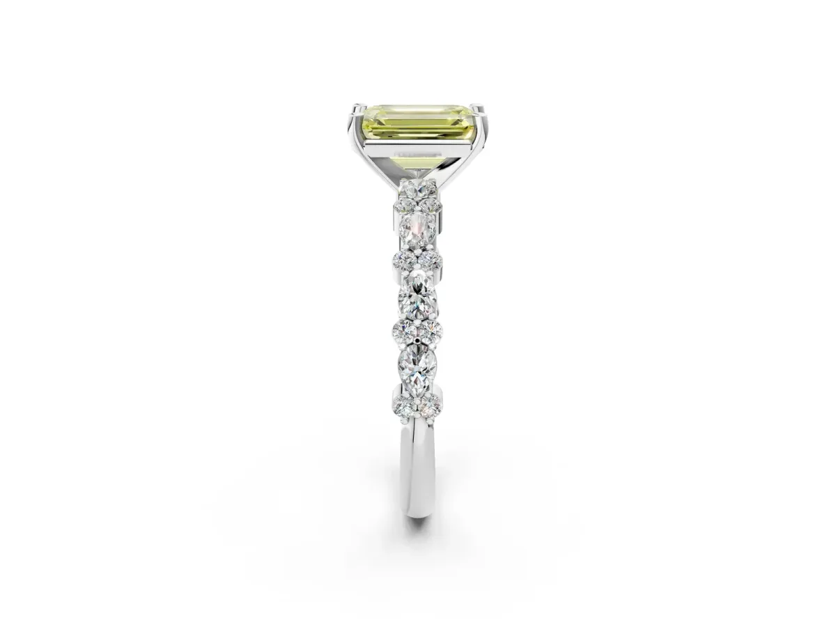 Fancy Yellow Emerald Cut Diamond Side Stone Solitaire Ring with Round and Four-Prong Setting White gold