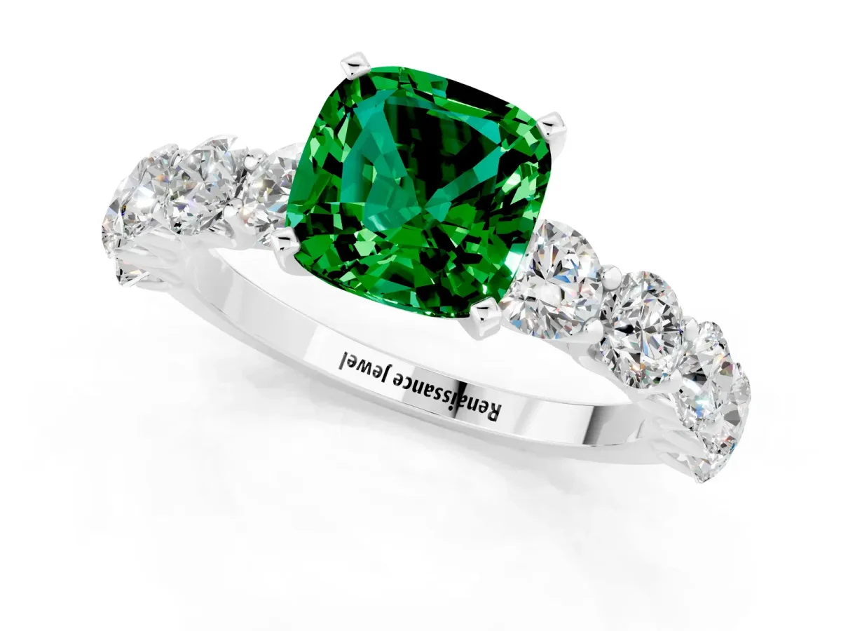 Cushion Cut Emerald Prong Setting with Side Stones on a Pave Band Platinum