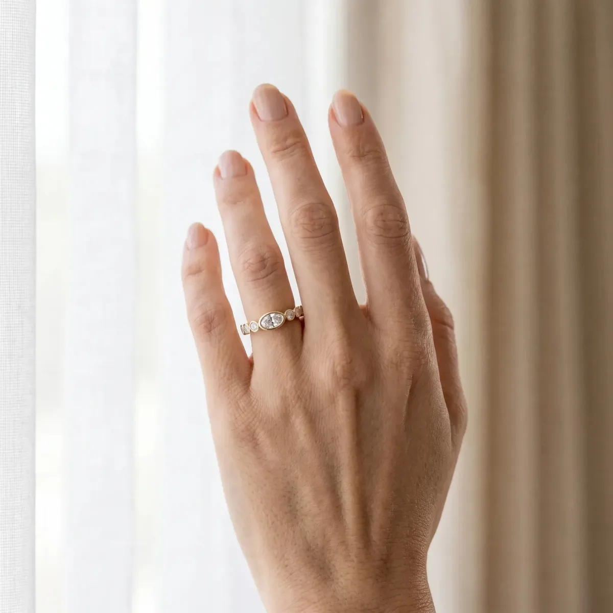 Bezel Set Oval Diamond Half Eternity Band Yellow gold