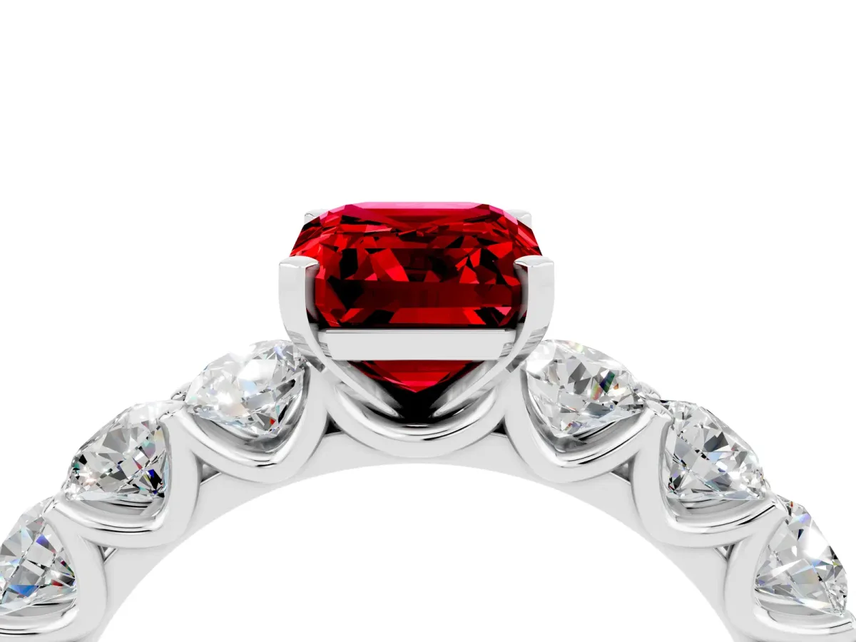 Emerald Cut Ruby Prong Setting with Side Stones on a Pave Band Platinum