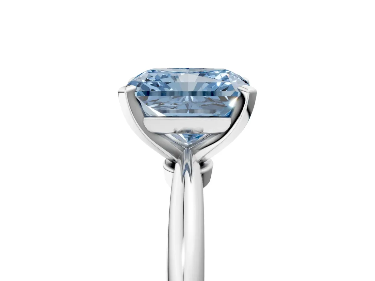 Fancy Blue Radiant Cut Diamond Solitaire Ring with Six-Prong Setting and Classic Band Silver
