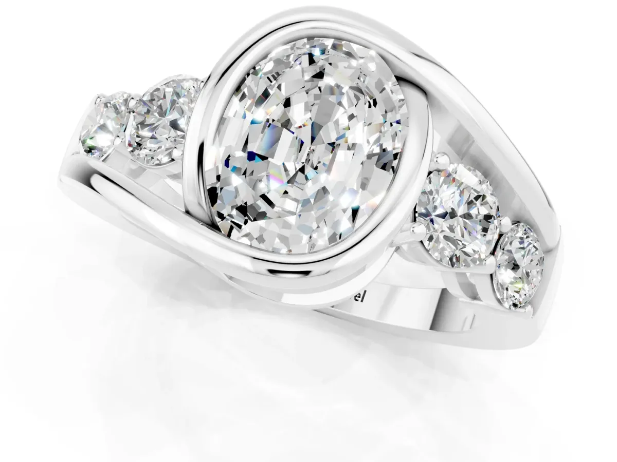 Bezel Set Oval Cut Moissanite Bypass Ring with Round Accents Silver
